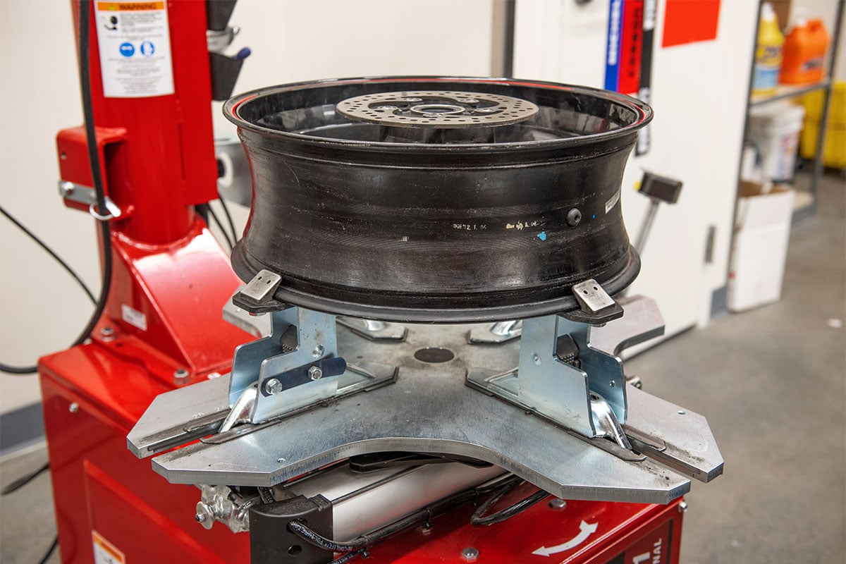 hunter motorcycle wheel service with smartweight pro wheel balancer and tcx table-top tire changer at cycle gear