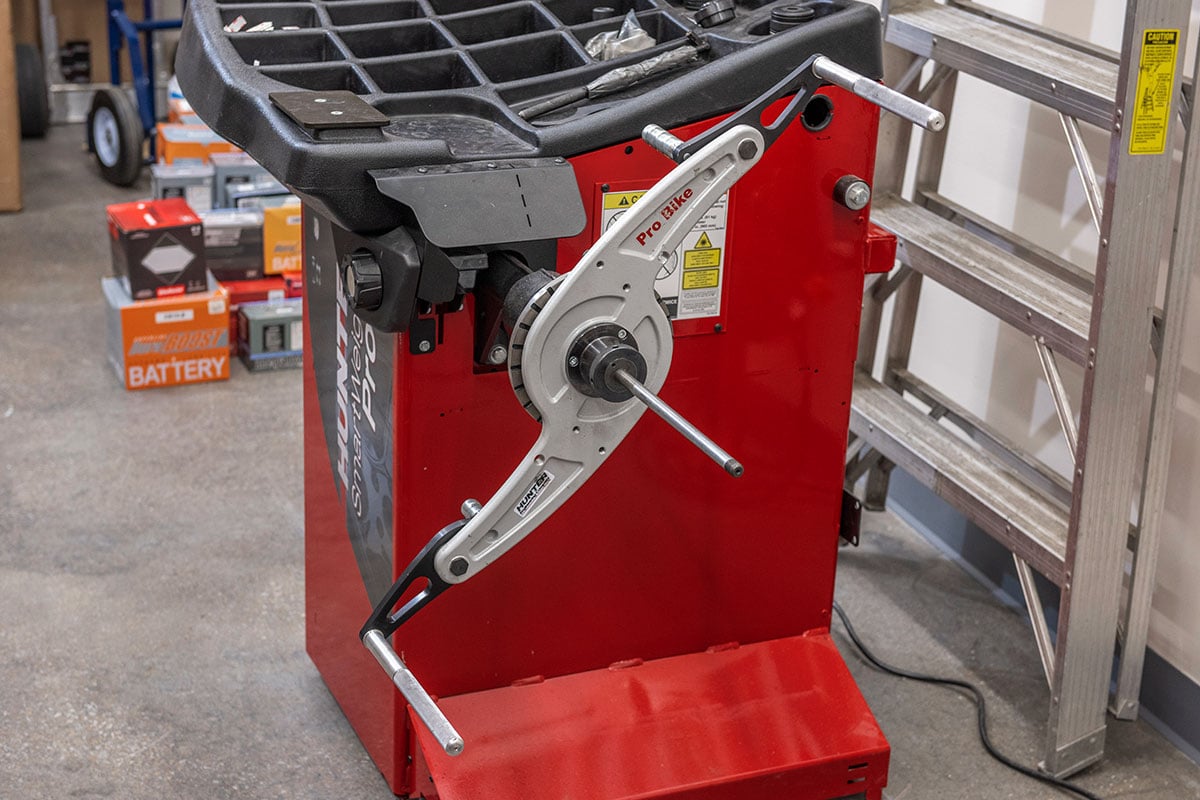hunter motorcycle wheel service with smartweight pro wheel balancer and tcx table-top tire changer at cycle gear